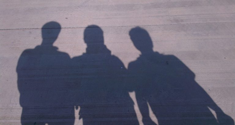 The Shadow of Three